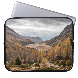BIRD'S EYE VIEW PHOTOGRAPHY OF TREES NEAR MOUNTAIN LAPTOP SLEEVE