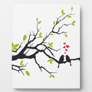 Birds in love with red hearts on spring tree plaque