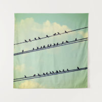 Birds on wires, vintage blue sky.