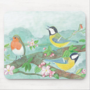 Birds singing on a blossoming tree branch mouse pad