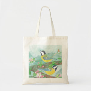 Birds singing on a blossoming tree branch tote bag