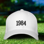 Birth Year Dad Embroidered Hat, Flexfit White Cap<br><div class="desc">This Simple Birth Year 1984 Dad Minimalist Embroidered Hat, Flexfit White Cap is perfect for trendy and sporty dad. 🦋 NOTICE: the text on the back.🦋 You can easily customise the product by adding your own year and text ("dad", "father", "Mike"..) to make it completely unique. You can also change...</div>