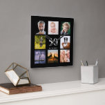 Birthday black photo collage guy square wall clock<br><div class="desc">A wall clock as a gift for a 50th (or any age) birthday for a guy,  celebrating his life with a collage of 8 of your own photos.  Personalise and add age 50,  and a date.  Date of birth or the date of the anniversary.  White coloured letters.  Black background.</div>