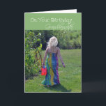 Birthday Granddaughter, young girl in garden Card<br><div class="desc">A birthday card for Granddaughter with a photo of a young blonde haired girl with long summer dress carrying a red bucket walking next to a garden.</div>