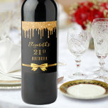 Birthday party black gold glitter 50 years wine label<br><div class="desc">A wine label for a girly and glamourous 50th (or any age) birthday party.  A chic black background,  decorated with faux gold glitter drips,  paint dripping look.   Personalise and add a date,  name,  age 50. The text: The name is written with a modern hand lettered style script. Golden letters.</div>