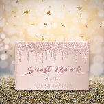 Birthday party rose gold glitter drips pink 50 guest book<br><div class="desc">A guestbook for a feminine and glamourous 50th (or any age) birthday. A faux rose gold background with an elegant faux rose gold glitter drips, paint drip look. The text: The name and the title: Guest Book are written in dark rose gold with a modern hand lettered style script. Tempate...</div>