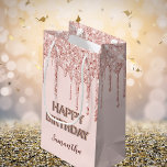 Birthday rose gold glitter drips monogram luxury  small gift bag<br><div class="desc">A gift bag for a girly and glamourous 21st (or any age) birthday. A rose gold background with rose gold and pink faux glitter drips, paint dripping look. The text: The name is written in dark rose gold with a modern hand lettered style script. The text: Happy Birthday is written...</div>