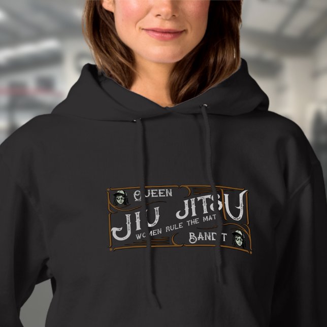 BJJ Queen Bandit Womens Brazilian Jiu Jitsu Hoodie (Woman's black BJJ hoodie worn by a female model in the gym)