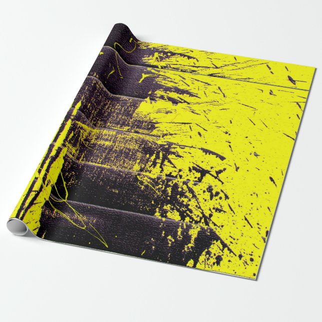 Black abstract splatter paint drips on a bright ye wrapping paper (Unrolled)