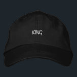 Black Adjustable Showcasing Regal King Men's Hat<br><div class="desc">Embrace classic style with this black cap boasting bold "King" embroidery. The adjustable visor and cotton fabric offer both comfort and style. A perfect addition to any outfit for a sophisticated look.</div>