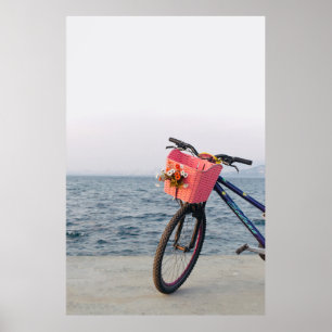 Black and blue bicycle with basket poster