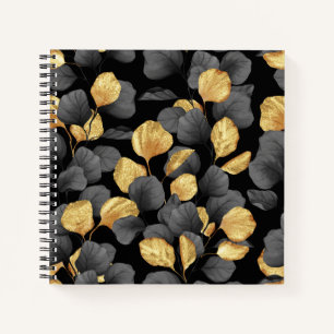 Black and gold leaves. Pattern Notebook