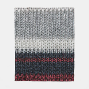 Black and grey knitting wool with red and white st fleece blanket