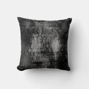 Black and grey material skinned with oil paint cushion