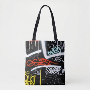 Black and multicolored graffiti art tote bag
