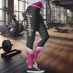 Black and pink floral white stripes & name leggings<br><div class="desc">These black modern workout leggings feature an elegant and delicate white floral design on a dark magenta background on the ankles and calves and a fuchsia stripe on the waistband.
Easily customisable by adding your name on both sides on a calligraphy white font.</div>