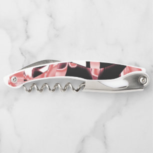 Black and salmon scraps, destroyed tapes on white corkscrew