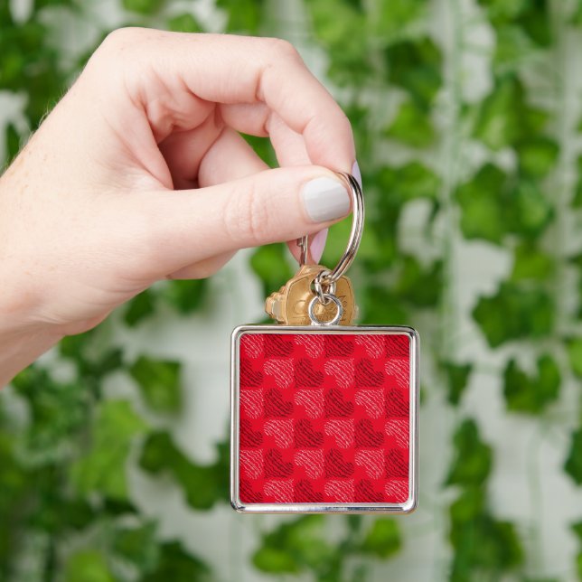 Black and White Alternating Heart Lines on Red Key Ring (Hand)