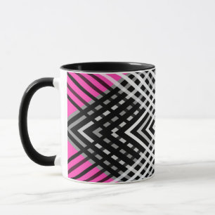 Black and white and gray intertwined stripes on a mug