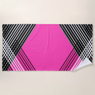 Black and white and grey intertwined stripes on a beach towel
