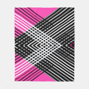 Black and white and grey intertwined stripes on a fleece blanket