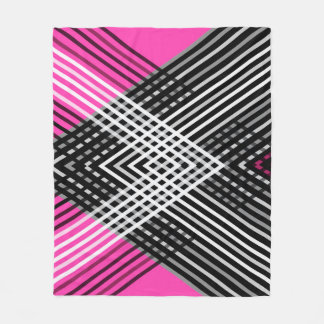 Black and white and grey intertwined stripes on a fleece blanket
