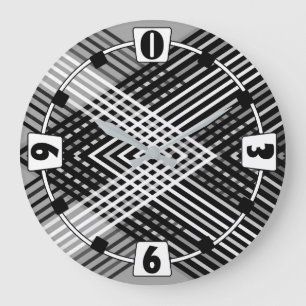 Black and white and grey intertwined stripes on a  large clock