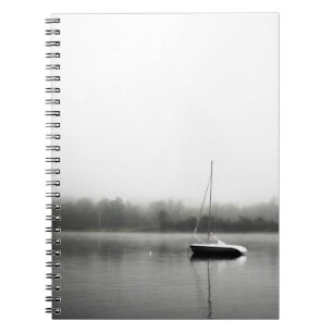 BLACK AND WHITE BOAT ON LAKE NOTEBOOK