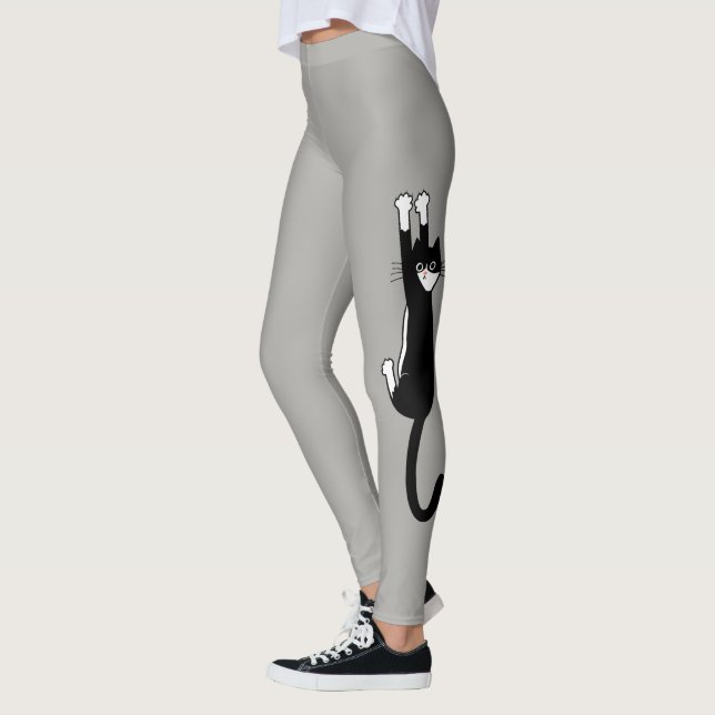 Black and White Cat Hanging On | Funny Tuxedo Cat Leggings (Left)