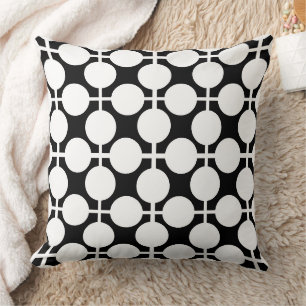Black and white chequered and polka dot pattern re cushion