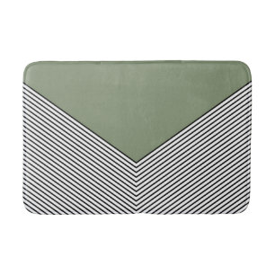Black and white chevron design and green triangle bath mat