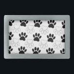 Black And White Dog Paw Print Pattern Rectangular Belt Buckle<br><div class="desc">A pattern in black and white of dog paw prints.
Original design cartoon style.</div>