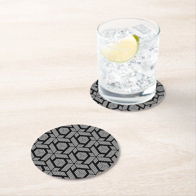 Black and white dots geometric pattern round paper coaster (Insitu)