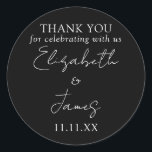 Black And White Elegant Script Wedding Thank You Classic Round Sticker<br><div class="desc">This black and white minimalist elegant script wedding thank you sticker can be personalised with your information in chic typography. Designed by Thisisnotme©</div>
