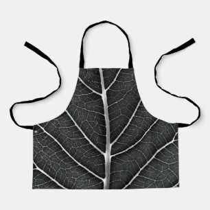 Black and White Glowing Leaf Close-Up Apron