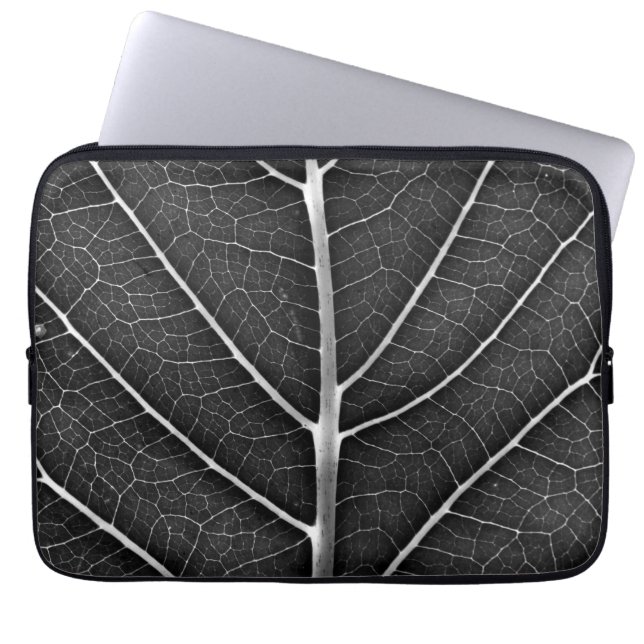 Black and white glowing leaf close-up laptop sleeve (Front)