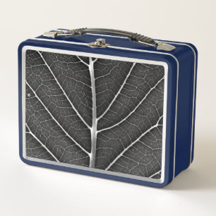 Black and white glowing leaf close-up metal lunch box