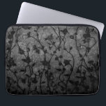 Black and White Gothic Antique Floral Laptop Sleeve<br><div class="desc">Unique contrasting textures and shades with floral vines creating a decorative silhouette pattern against a dark background.</div>