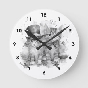 Black and white kittens with bow tie and cute hat round clock