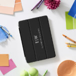Black and White Minimalist Modern Monogram iPad Pro Cover<br><div class="desc">Introducing our Black and White Minimalist Modern Monogram Collection: Embrace simplicity and sophistication with our minimalist designs, curated to elevate your style effortlessly. Crafted with a keen eye for modern aesthetics, this collection features sleek black and white designs accentuated by personalised monograms. From chic stationery to versatile accessories, our collection...</div>