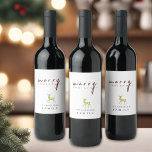 Black and White Minimalist Reindeer Christmas<br><div class="desc">Modern minimalist black and white Christmas wine label designed with a hand-painted watercolor gold reindeer and modern typography. Personalise for stylish gifts</div>