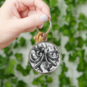 Black and white octopus resembles century squid key ring