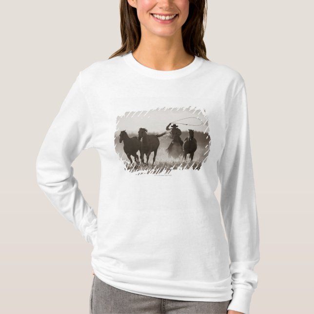 Black and White photo of a Cowboy Lassoing Horses T-Shirt (Front)