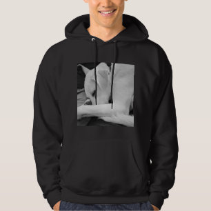 Black and White Photo of Cute Dog Resting with Dad Hoodie