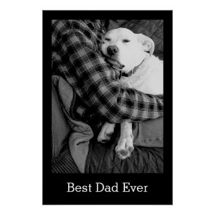 Black and White Photo of Dog Snuggling with Dad Poster