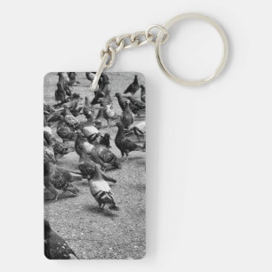 Black and white photography of many pigeons key ring