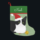 Black And White Santa Cat Personalised Small Christmas Stocking<br><div class="desc">Create a personalised stocking for your fur baby. This design consists of a short hair black and white cat with a Santa hat in Christmas colours with the ability to customise to your needs. The colour of the background and text can be changed if desired. Original design by Night Owl's...</div>