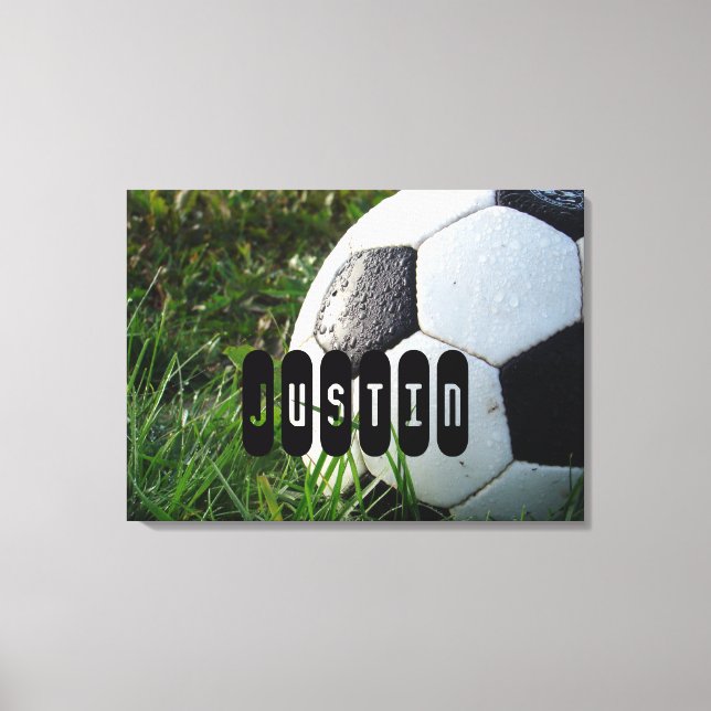 Black and White Soccer Ball in Green Grass Canvas Print (Front)