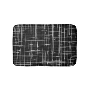 Black and white striped bath mat