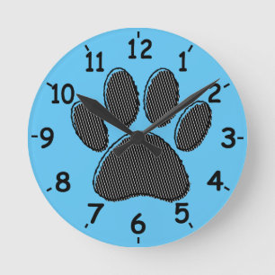 Black and White Striped Puppy Paw Print On Blue Round Clock